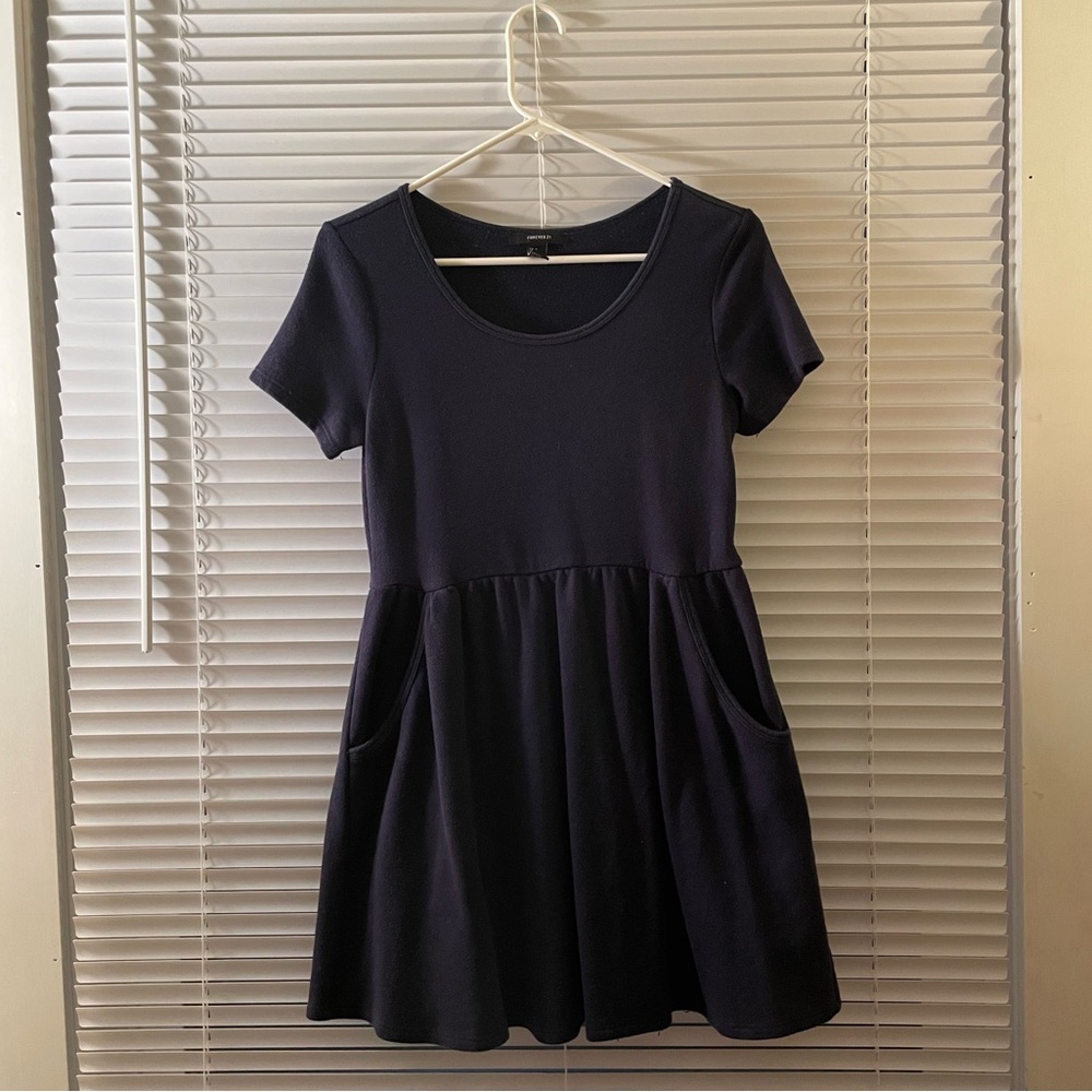 Forever 21 navy blue skater dress with pockets. Size: Medium